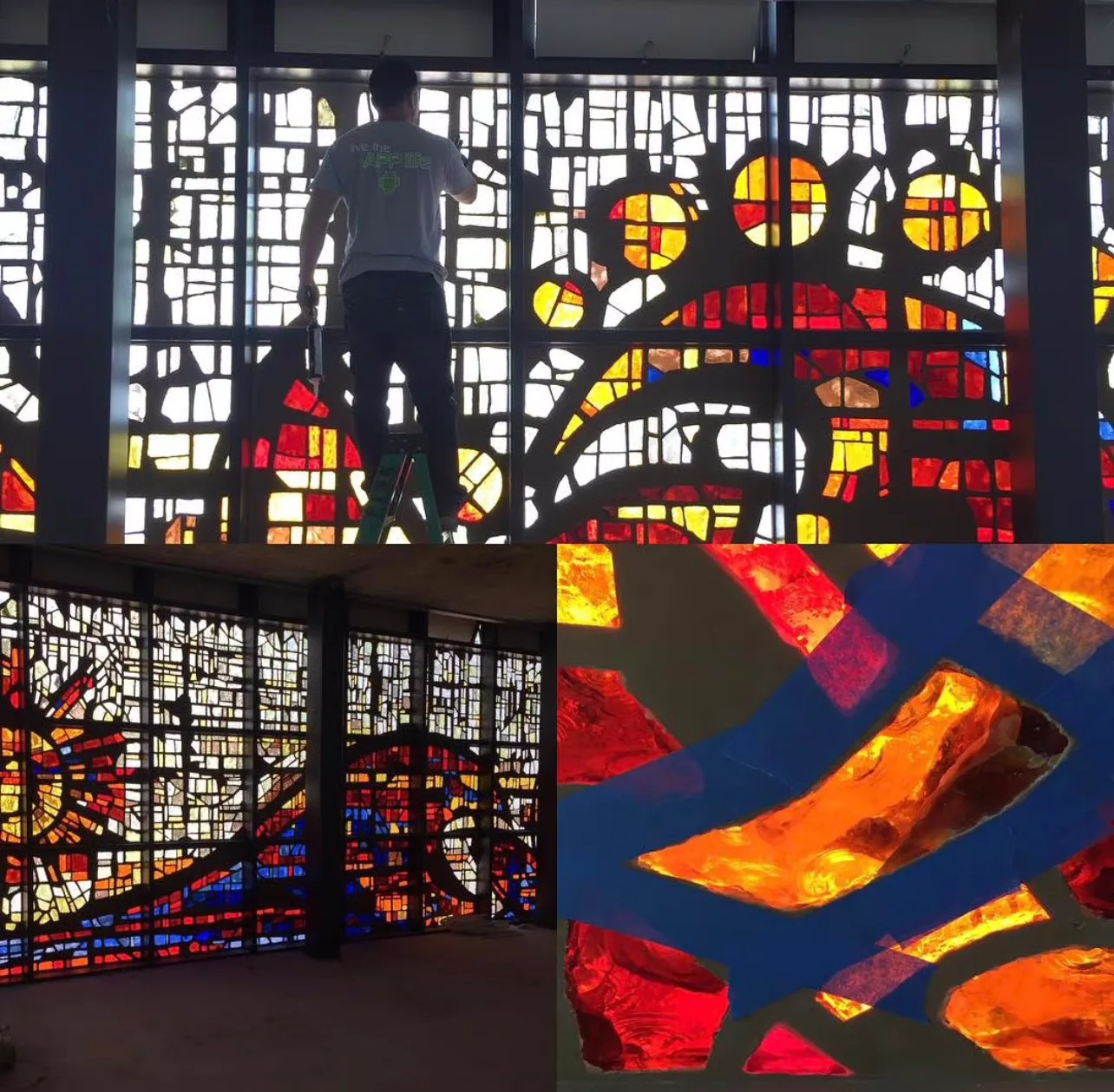 Gothic Revival cathedral interior with four tall pointed arch figurative stained glass windows above altar